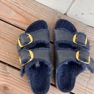 Birkenstock slip ons lined with blue fur
